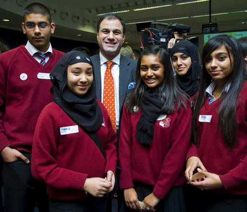      Lord Bilimoria with pupils from Langdon School. A team from there will compete today in the London Regional Final of the Make Your Mark Challenge.